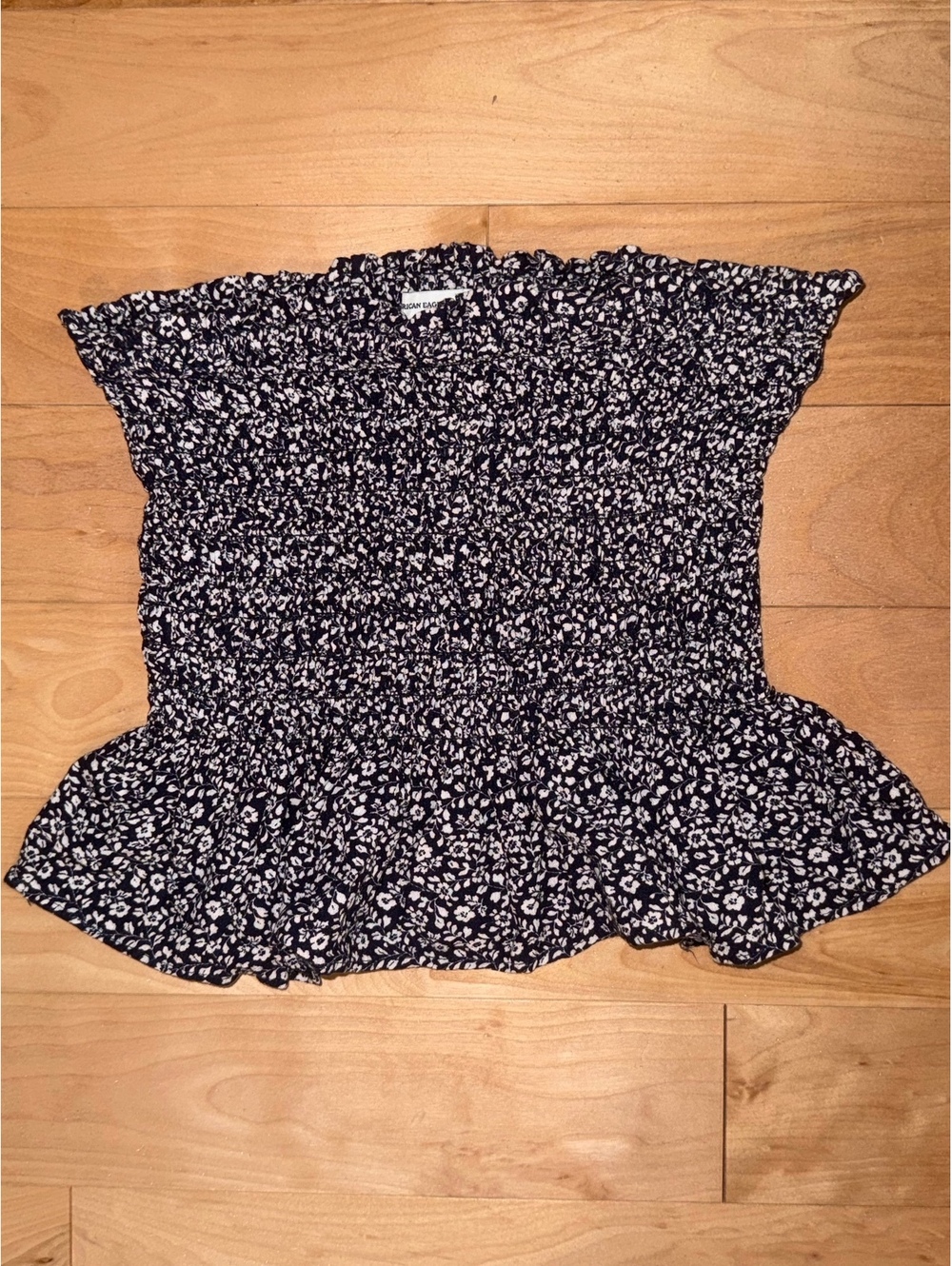Garage floral smocked peplum top